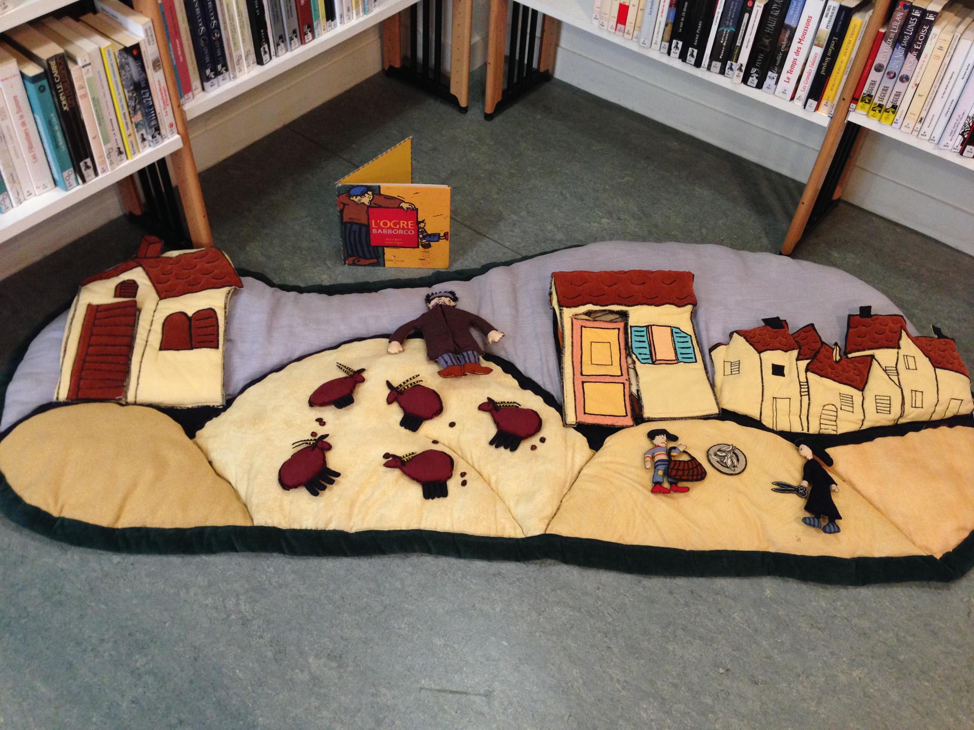 Un raconte-tapis à la bibliothèque! – Ecole St Joseph Saint Révérend